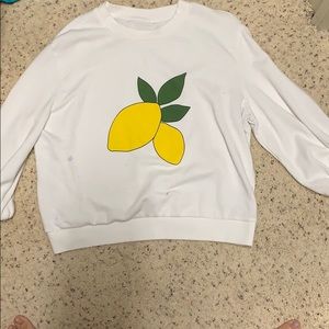 A women’s white Sweatshirt.